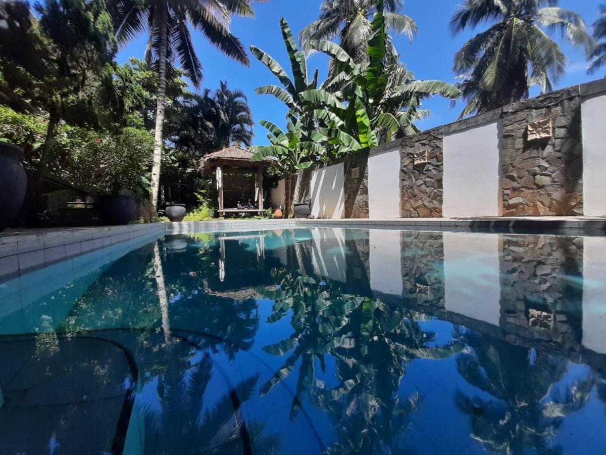 Guesthouse The 4 Fish Manado Bagian luar foto