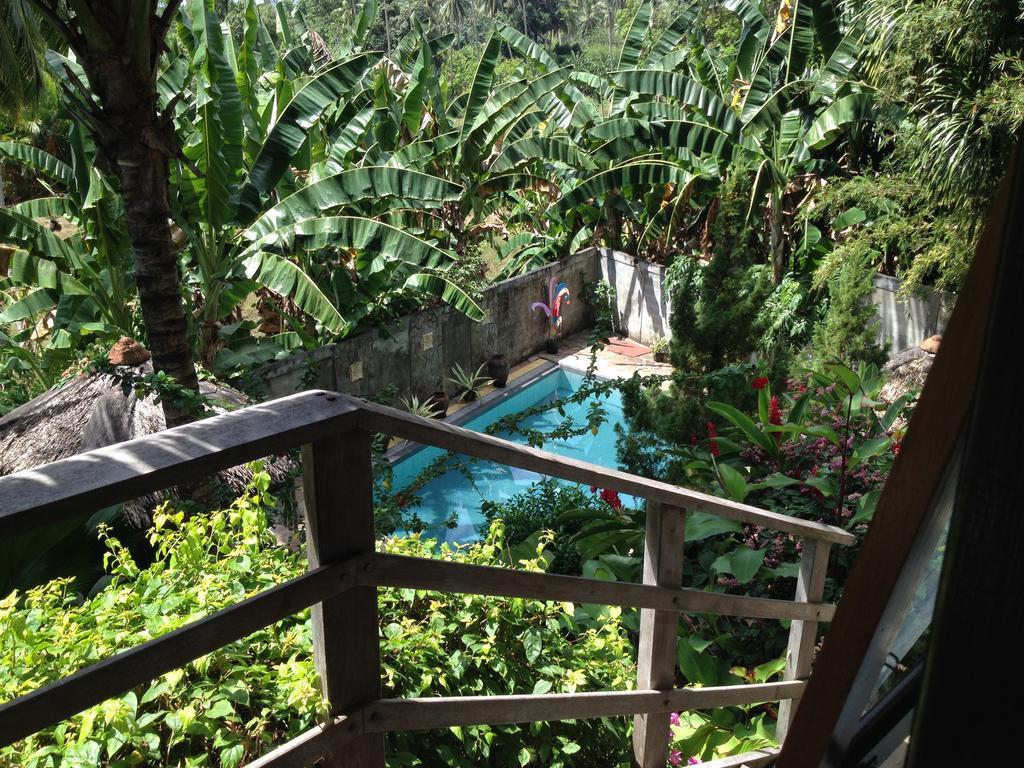 Guesthouse The 4 Fish Manado Bagian luar foto